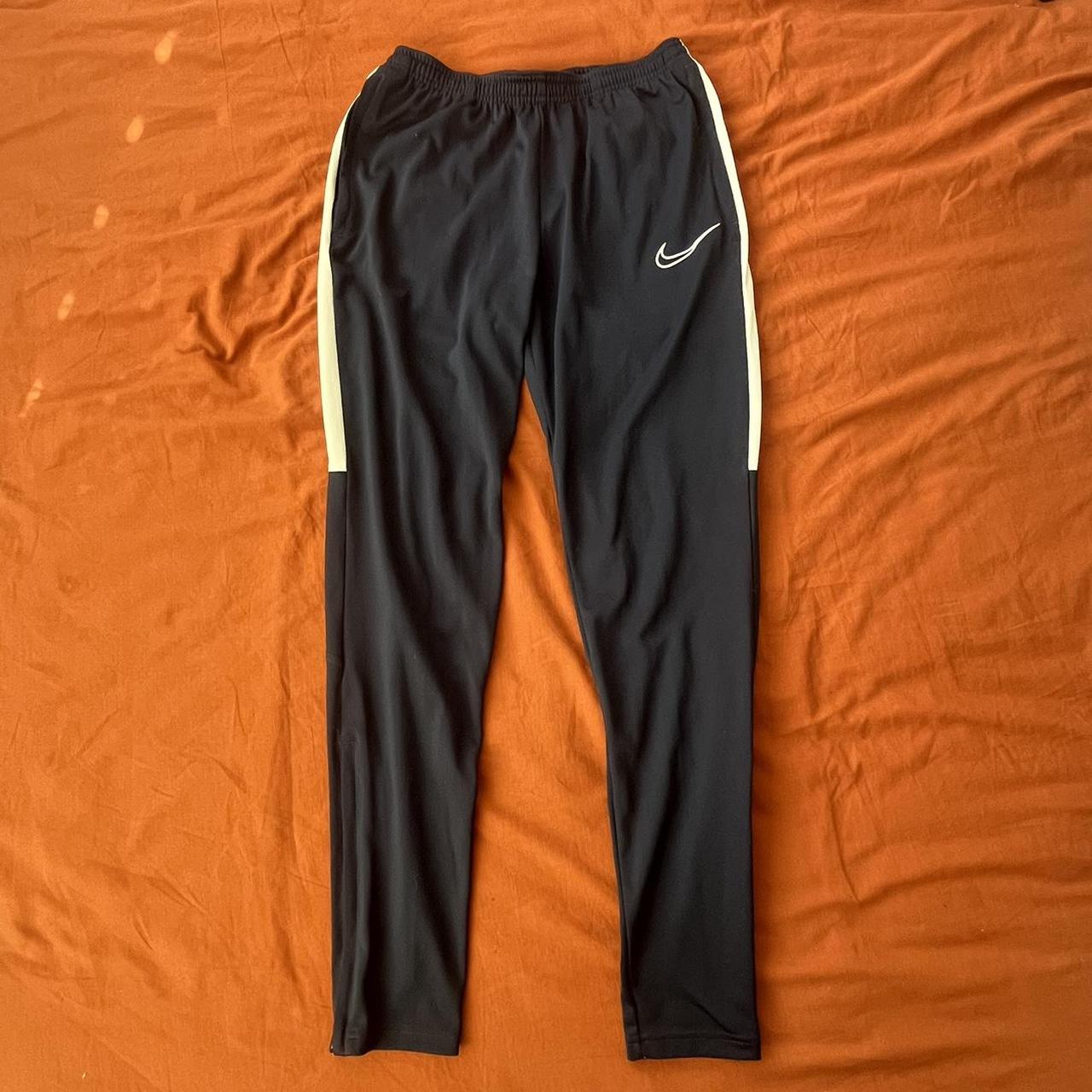 Men’s navy Nike joggers in size small. Zipped... - Depop