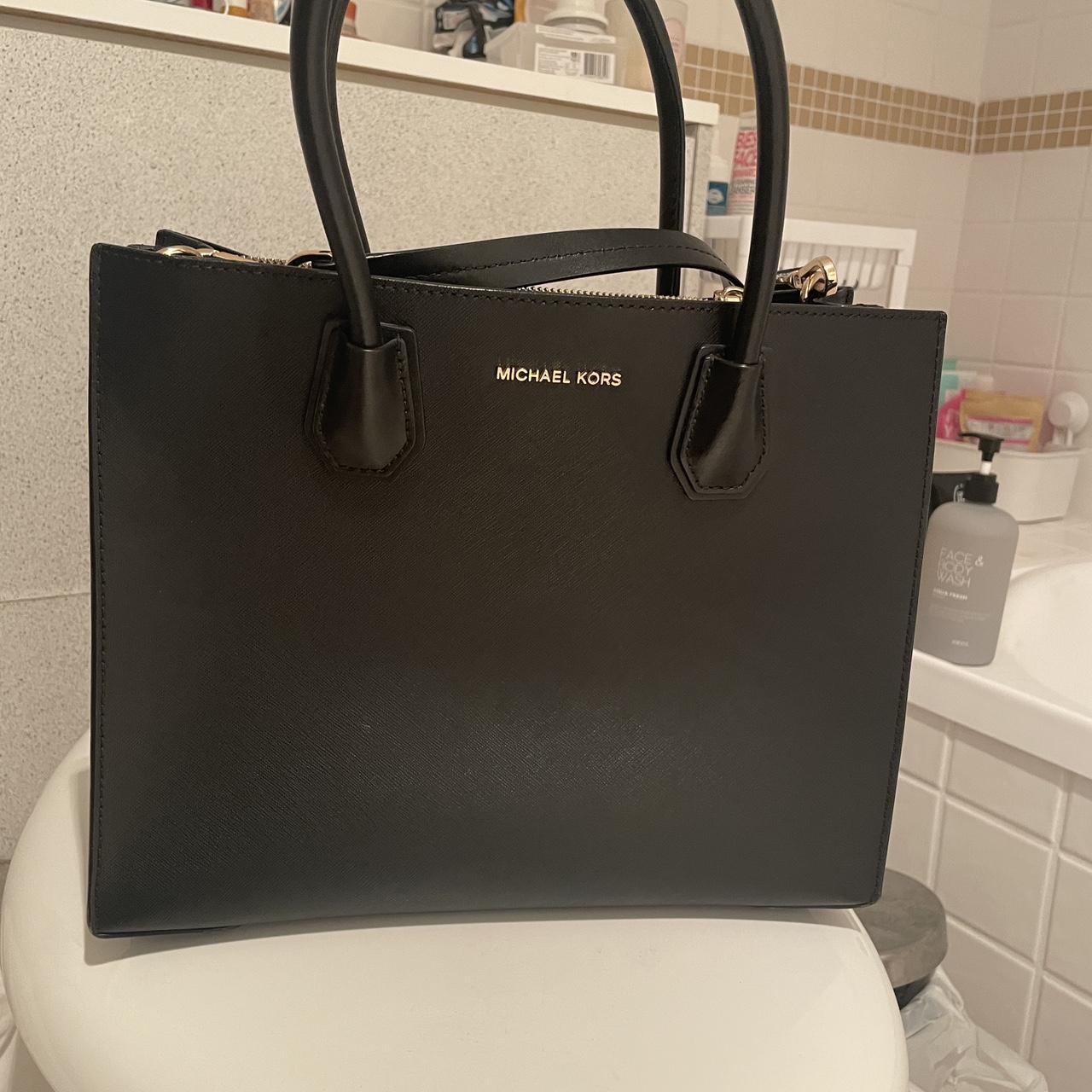 This Michael Kors black bag is a must have for Depop