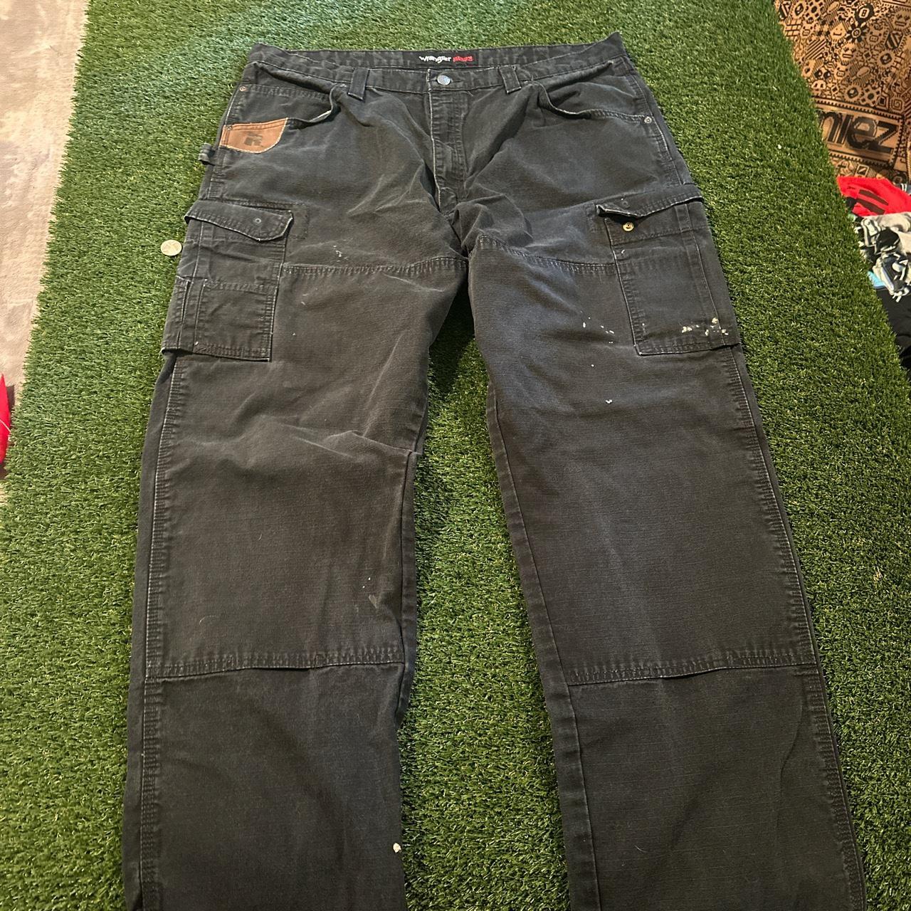 Black wrangler, rig, double knees no tag but size... - Depop