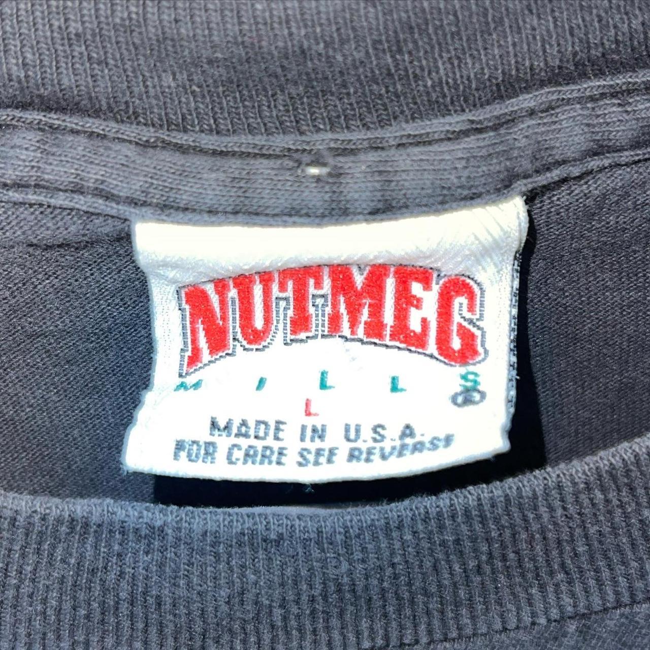 Nutmeg Men's Black T-shirt | Depop