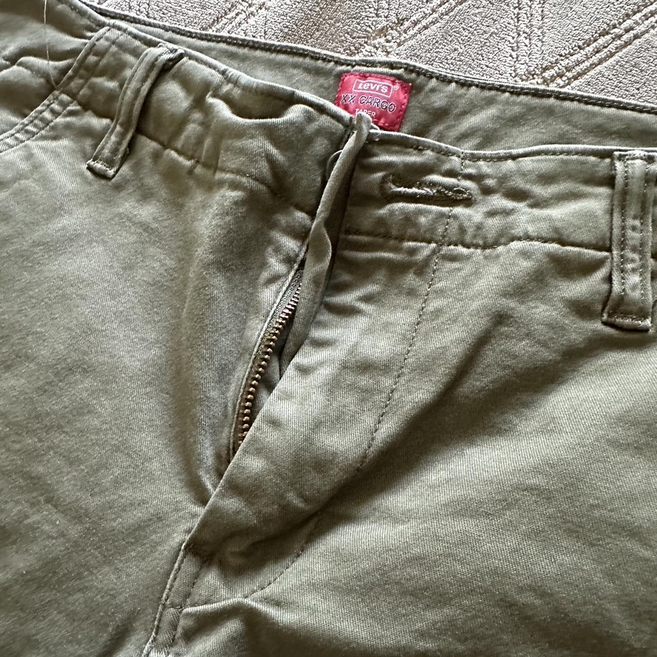 Levi’s green tapered cargo pants Size... - Depop