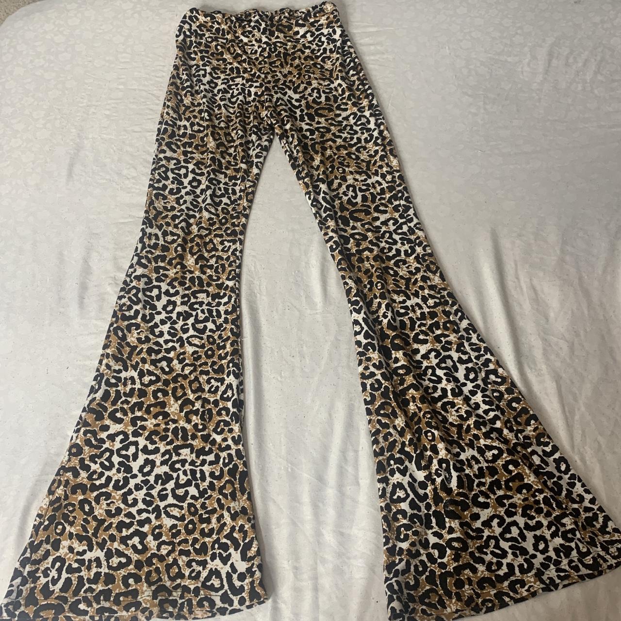 leopard print flared pants with elasticated waist... - Depop