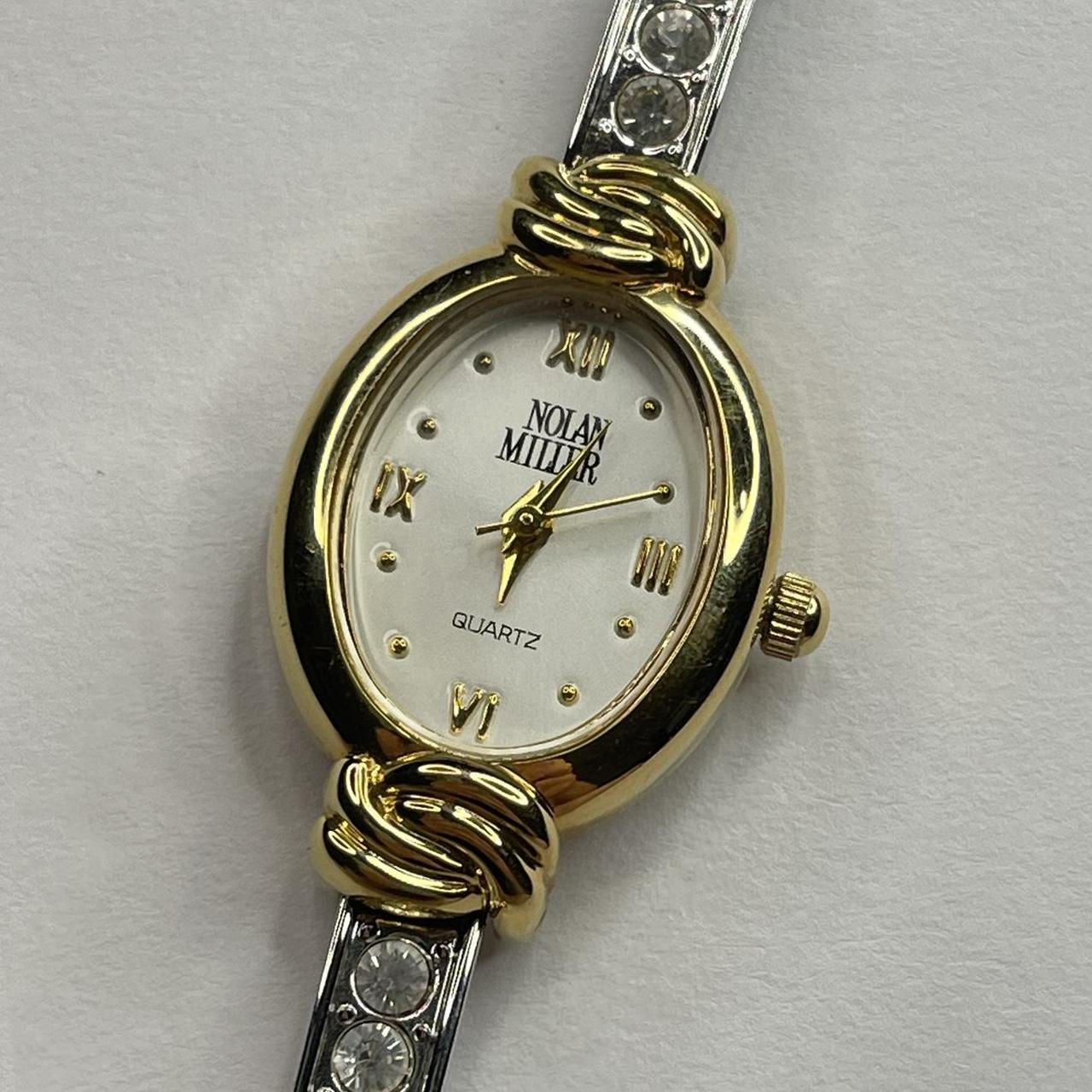 Nolan Miller two tone watch with Depop