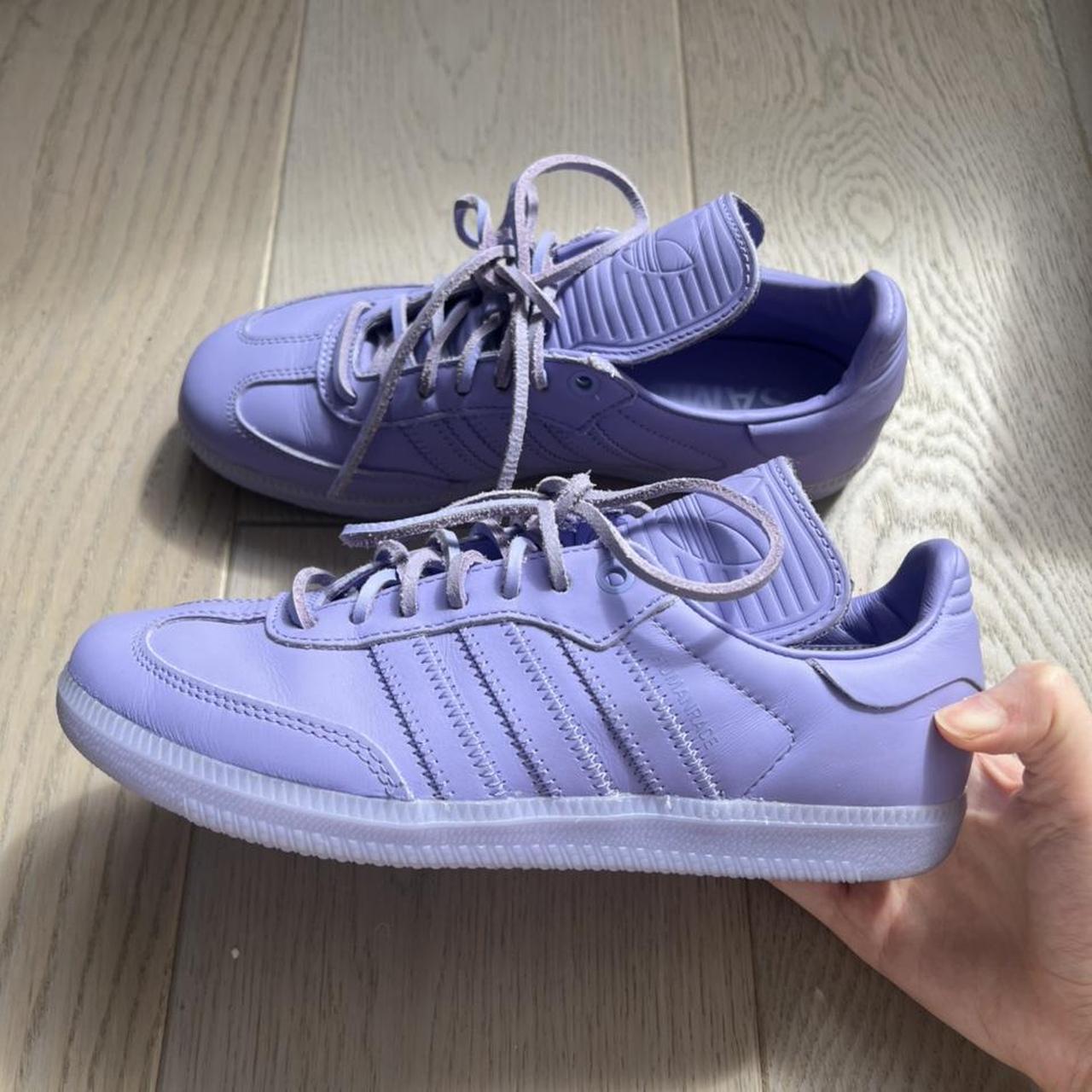 purple human race shoes