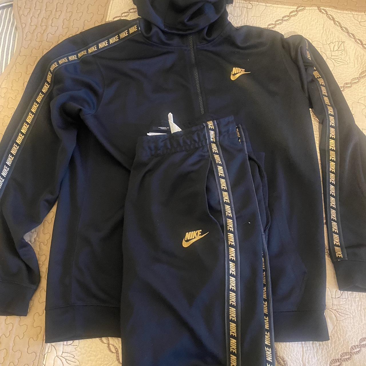 Black and gold store nike jumpsuit