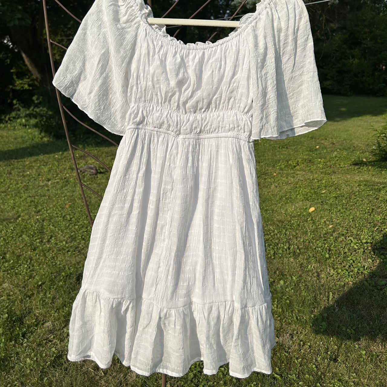 White flutter sleeve dress Small ruffles at the... - Depop