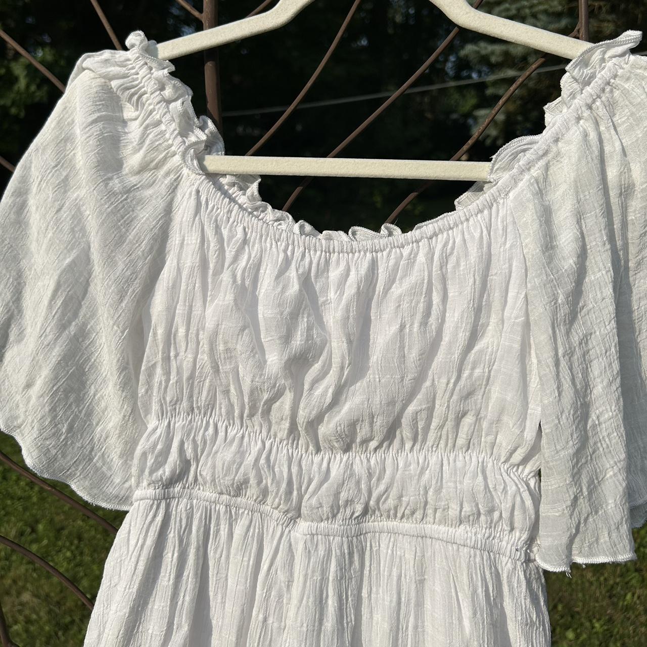 White flutter sleeve dress Small ruffles at the... - Depop