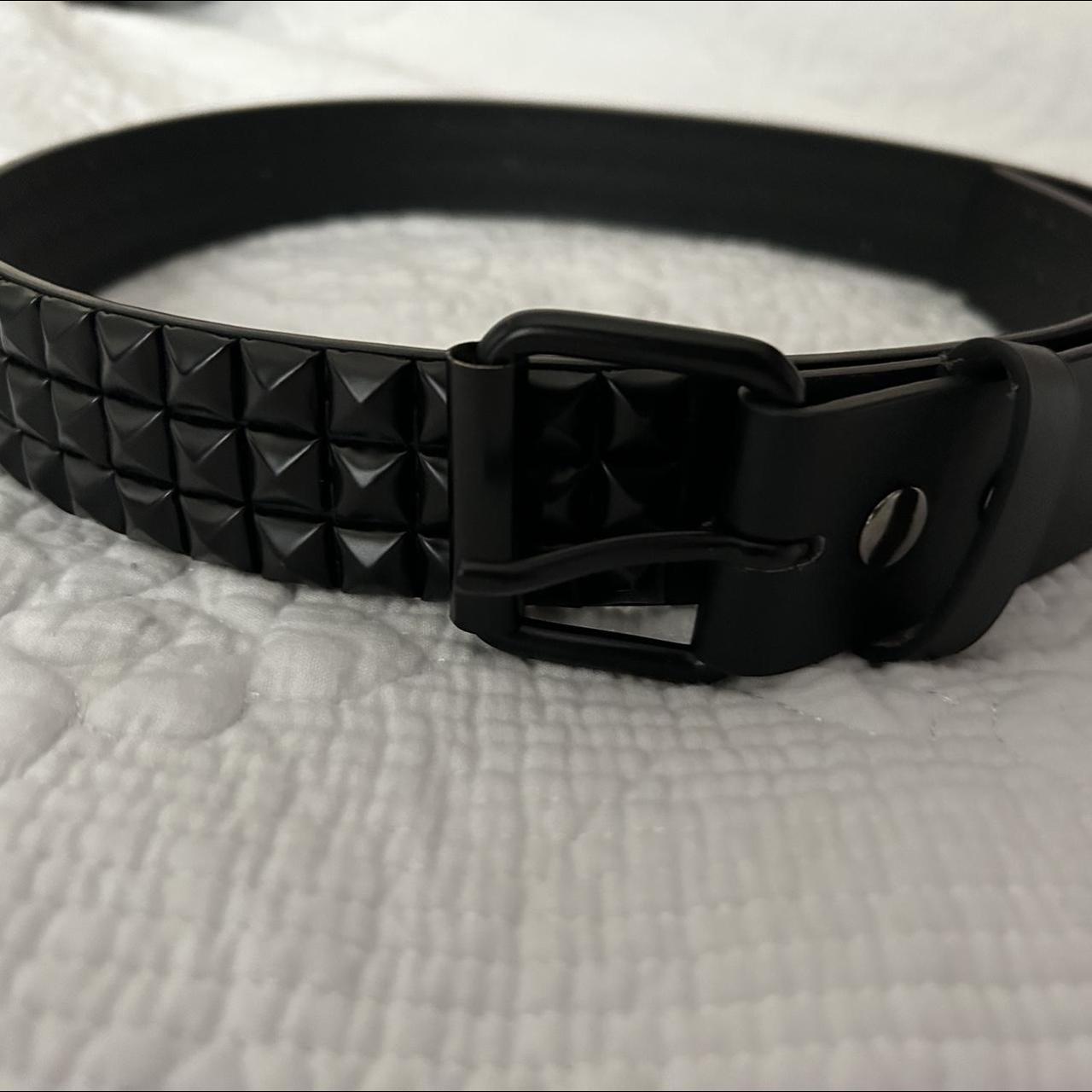 Black studded Hot Topic belt. Size L. Hole created... Depop