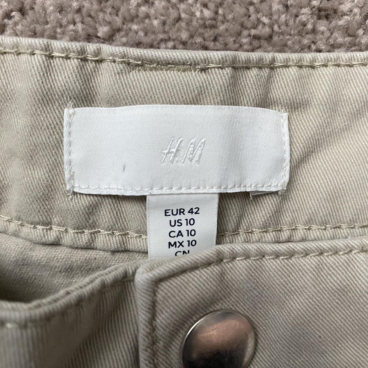 H&M Cargo Cream Pants Clicking button Small hole on... - Depop