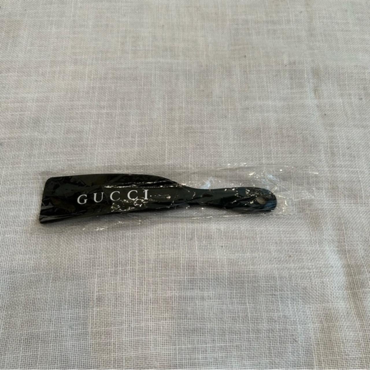 •Gucci Shoe Horn Unisex NEW Gucci shoe horn, black... Depop