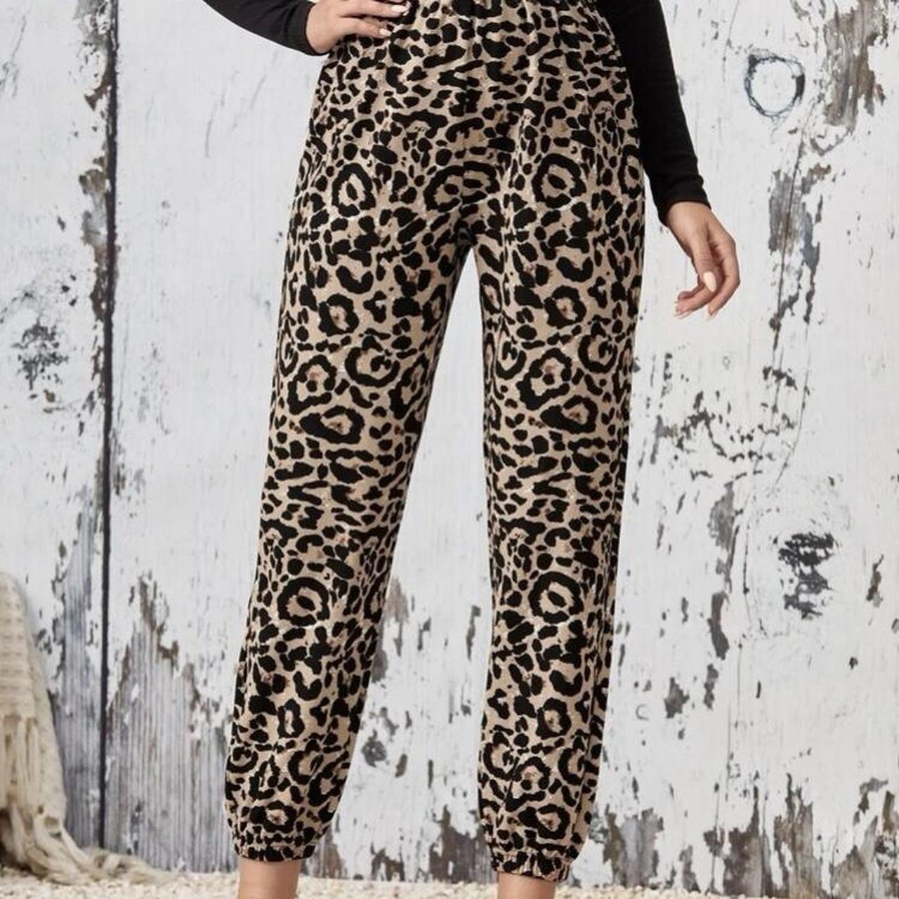 Leopard print pants. Elastic waist and cuffs. Thin... - Depop