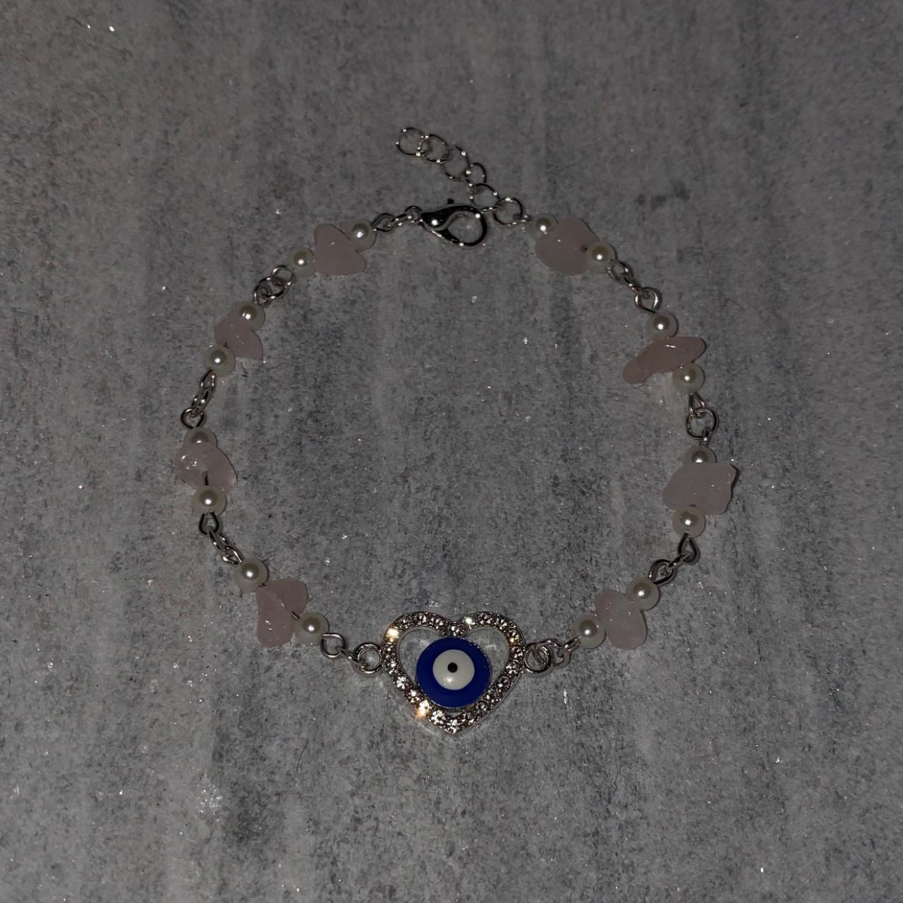 -Handmade rose quartz evil eye bracelet The evil... - Depop