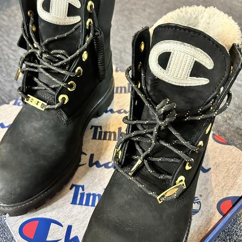 Champion black clearance and gold timberlands