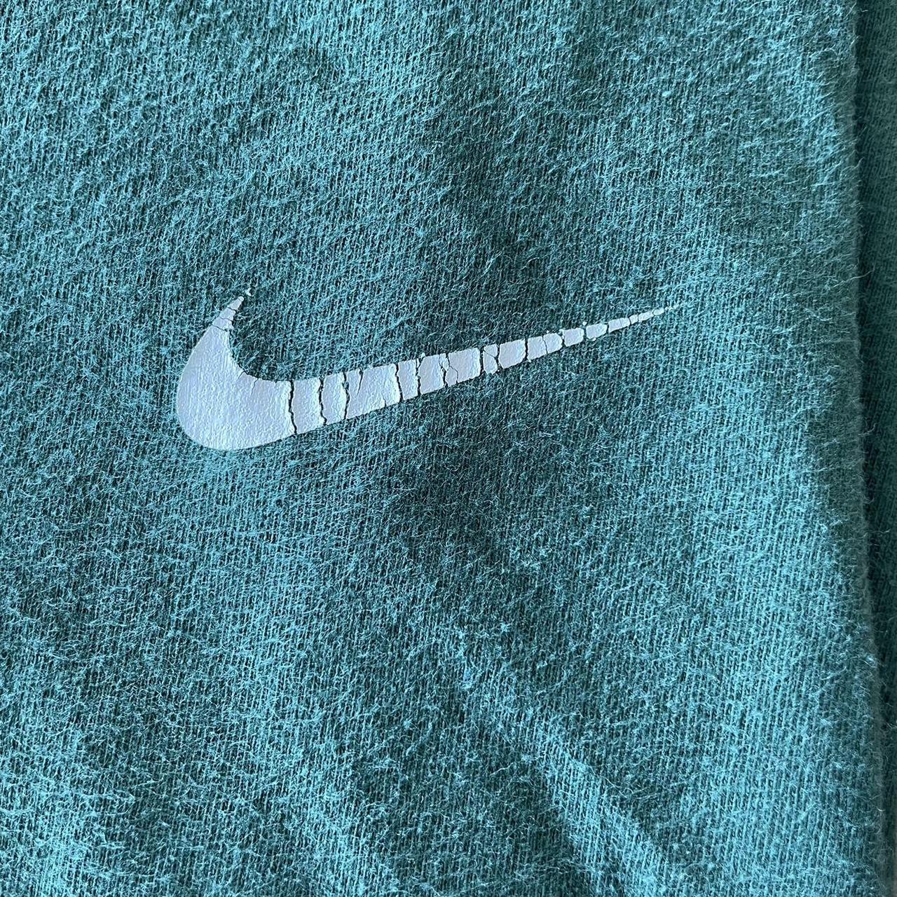 Faded, olive green front swoosh Nike T-shirt. Great... - Depop