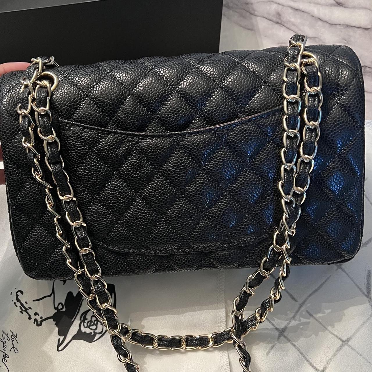 Chanel Women's Black and Gold Bag | Depop