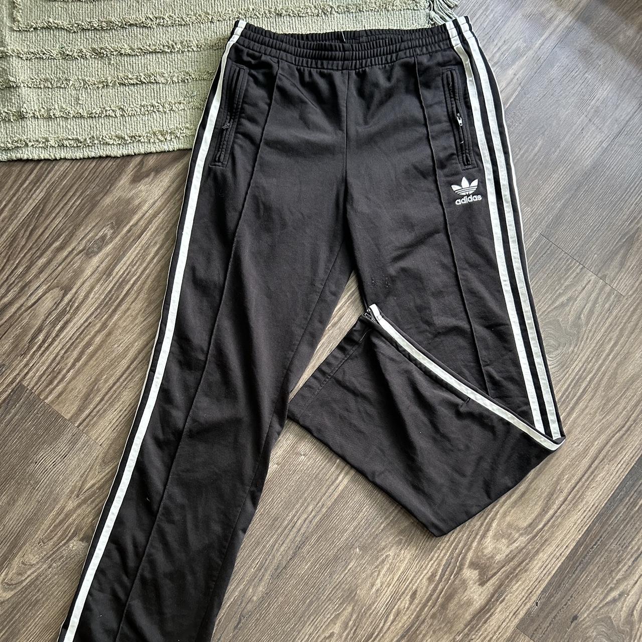 adidas pants pockets and bottoms have zippers size... Depop
