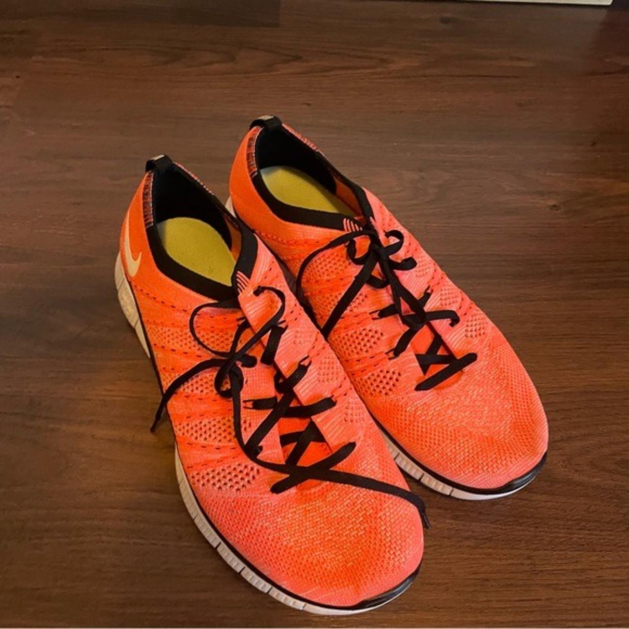 Nike free flyknit sales nsw mens orange