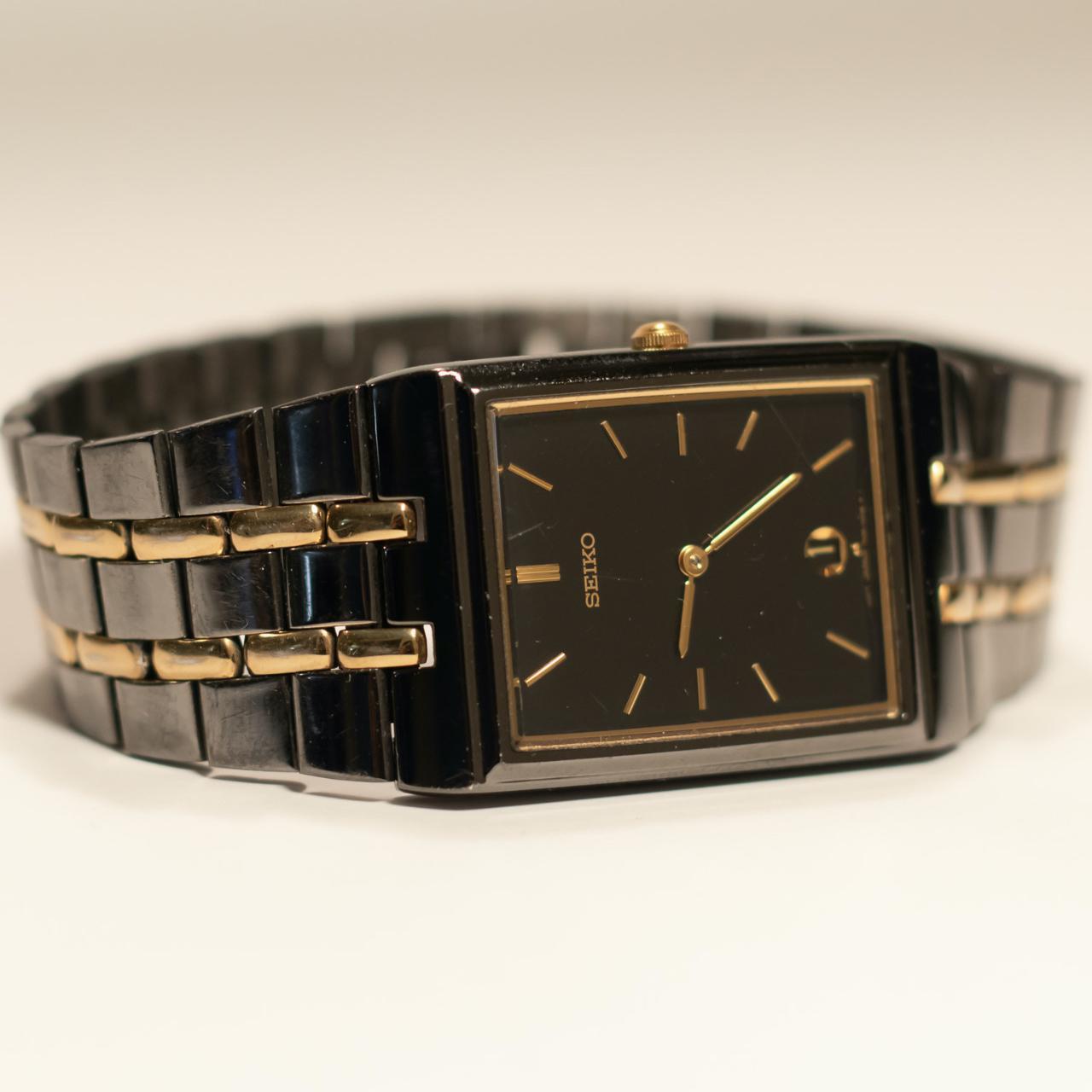 Seiko Men's Black and Gold Watch