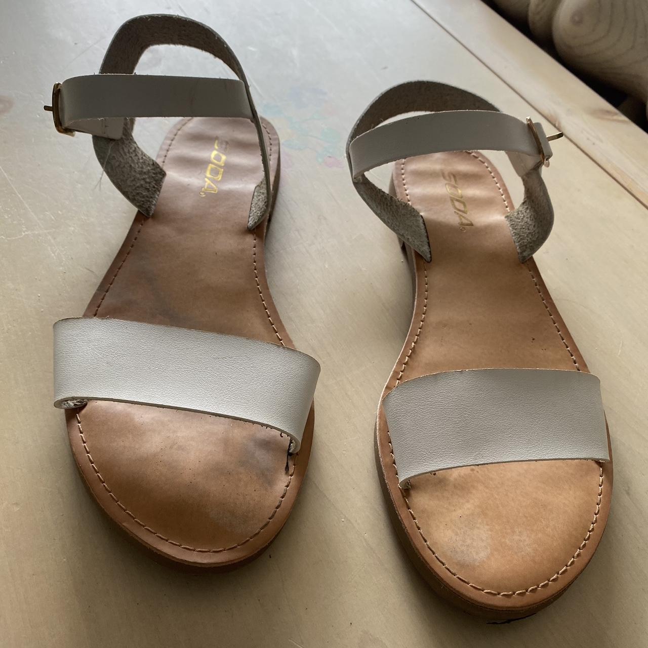 white and tan sandals