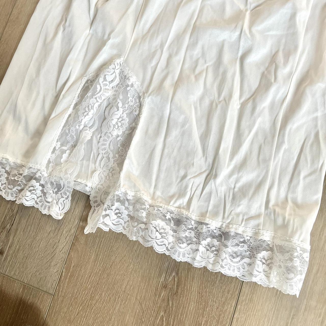 Vintage cream satin skirt with little slit and lace... - Depop