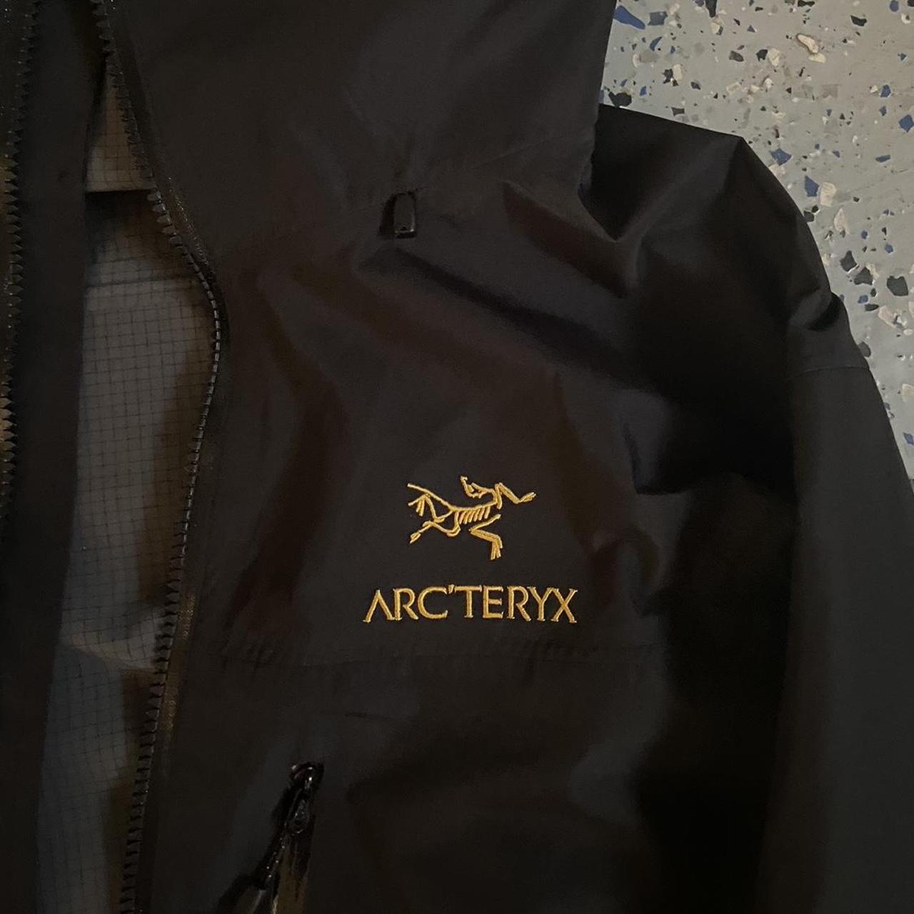 Arc'teryx Men's Black and Yellow Jacket | Depop