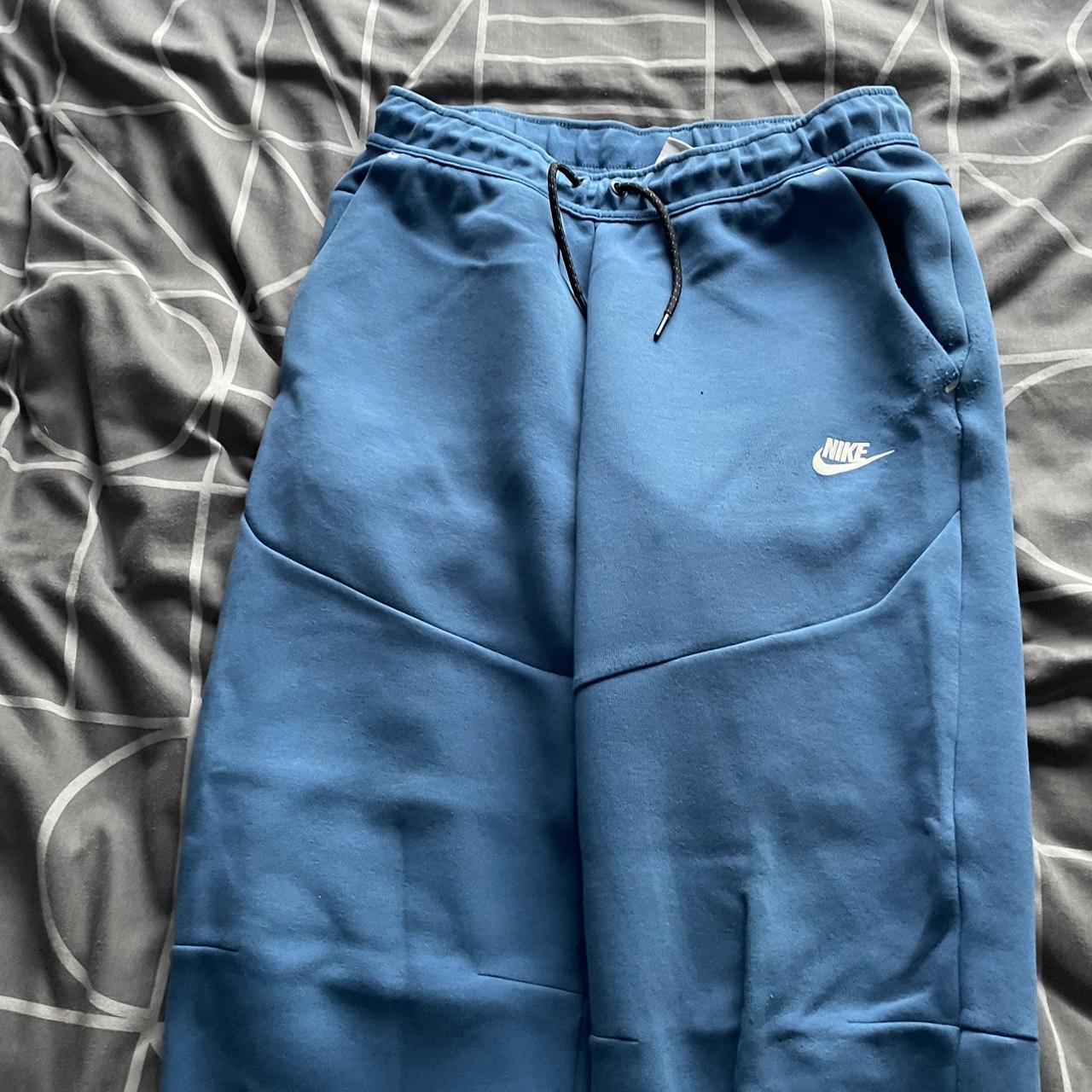 royal blue nike tech pants