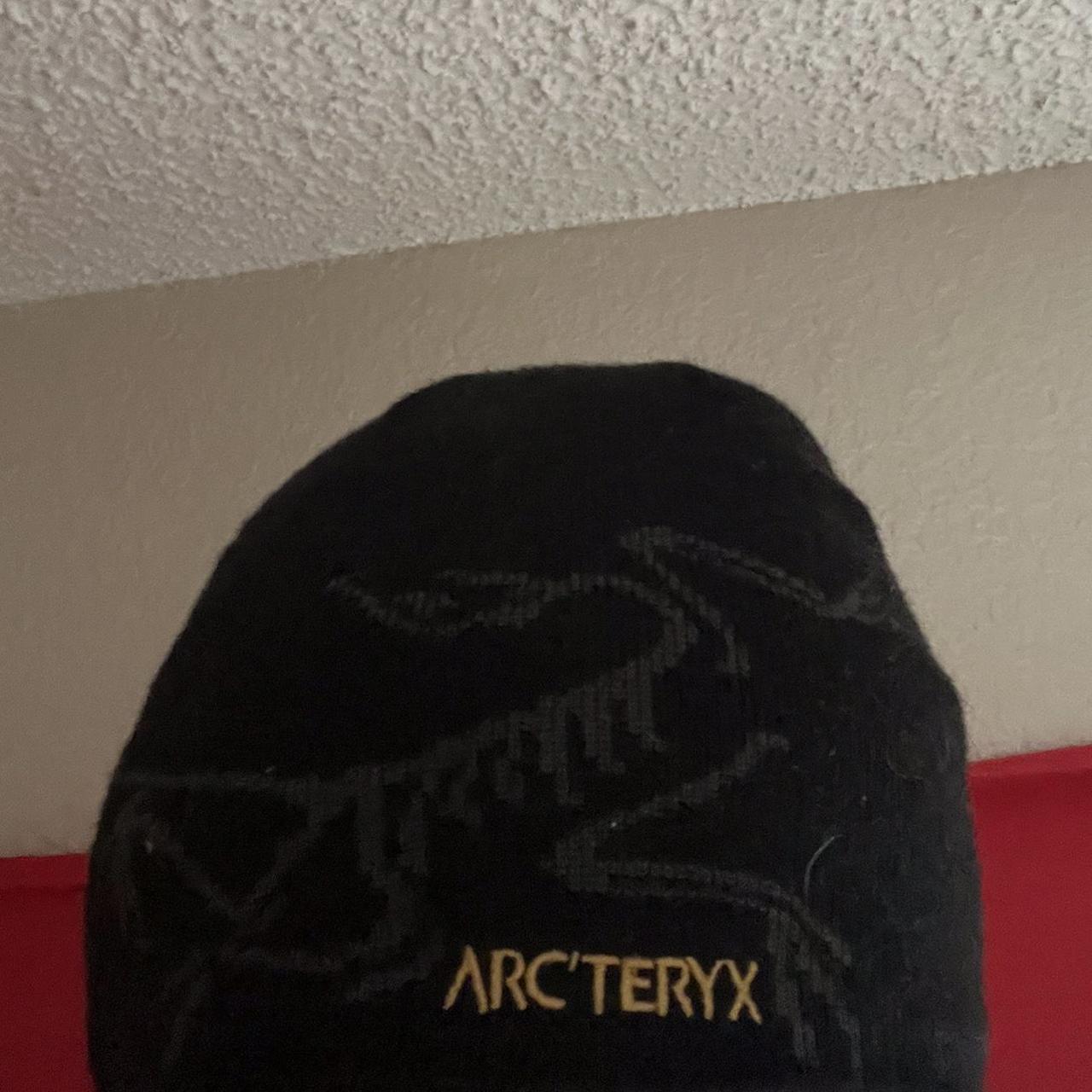 Arcteryx Black Beanie Has arc bird on it Depop
