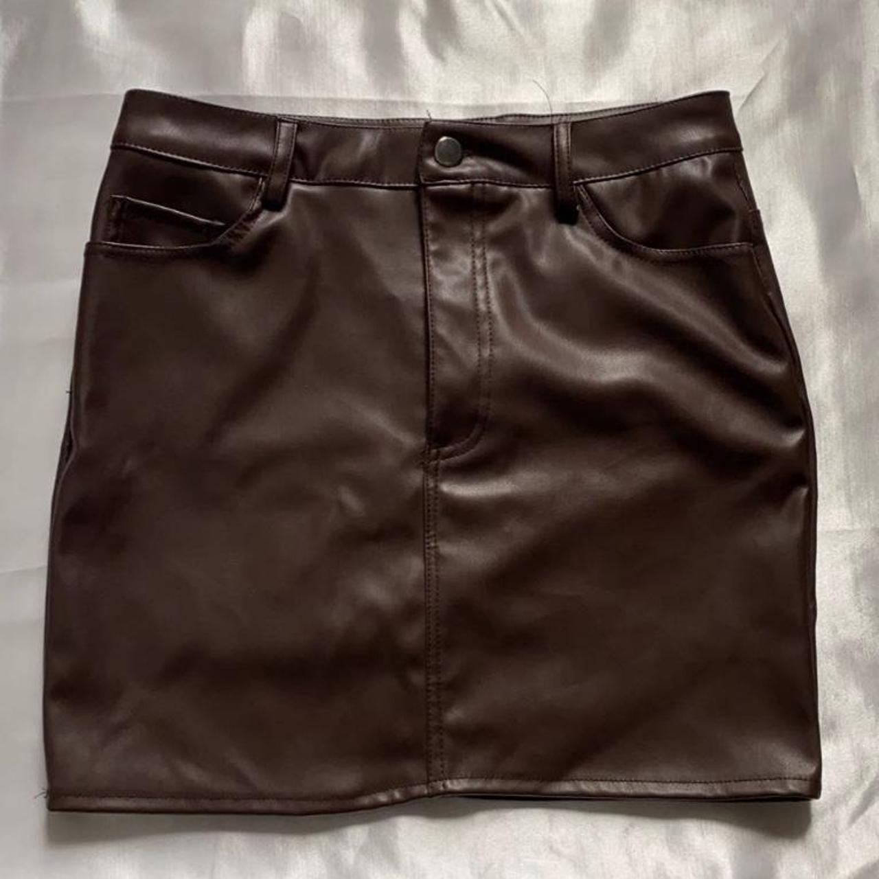 Brown faux leather mini skirt size... - Depop