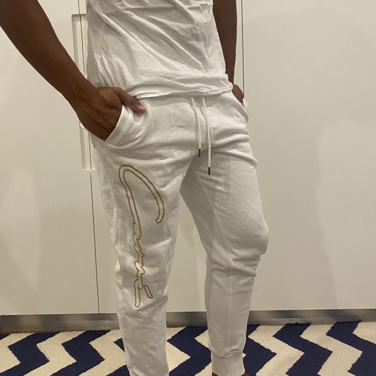 White and store gold joggers