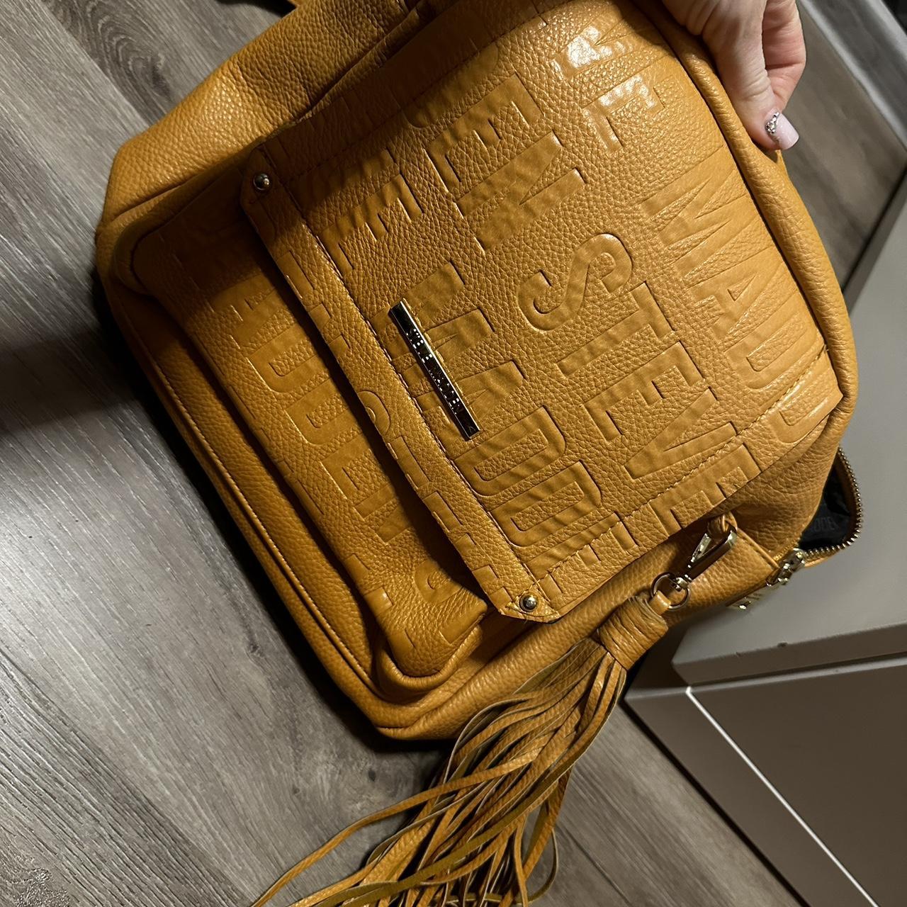 Steve madden shop mustard backpack