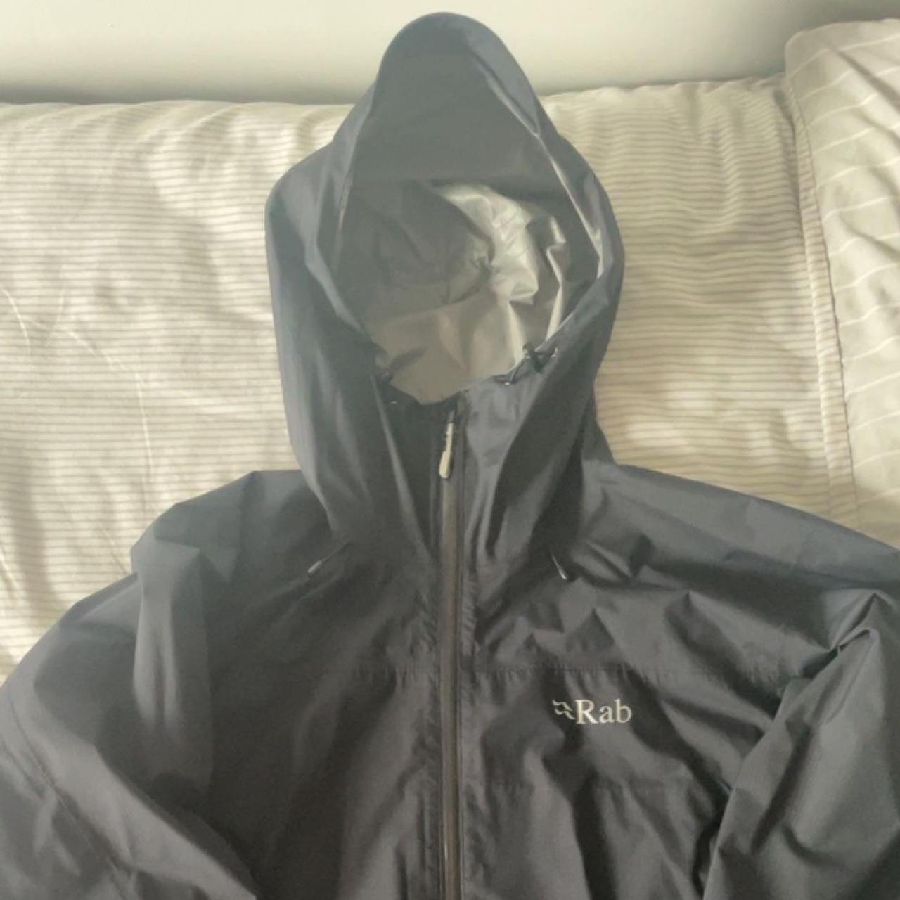Small rip near the bottom zip of the Large black RAB... - Depop