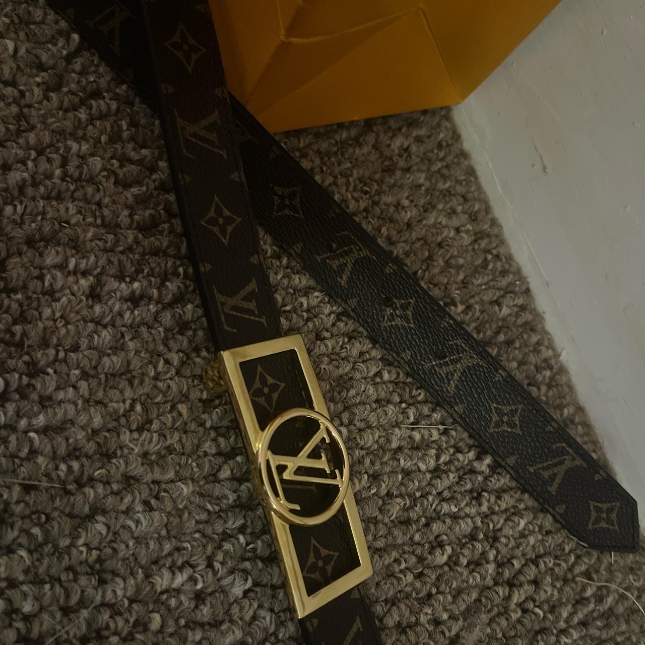 Brown and gold Lv belt, worn once has a extra hole