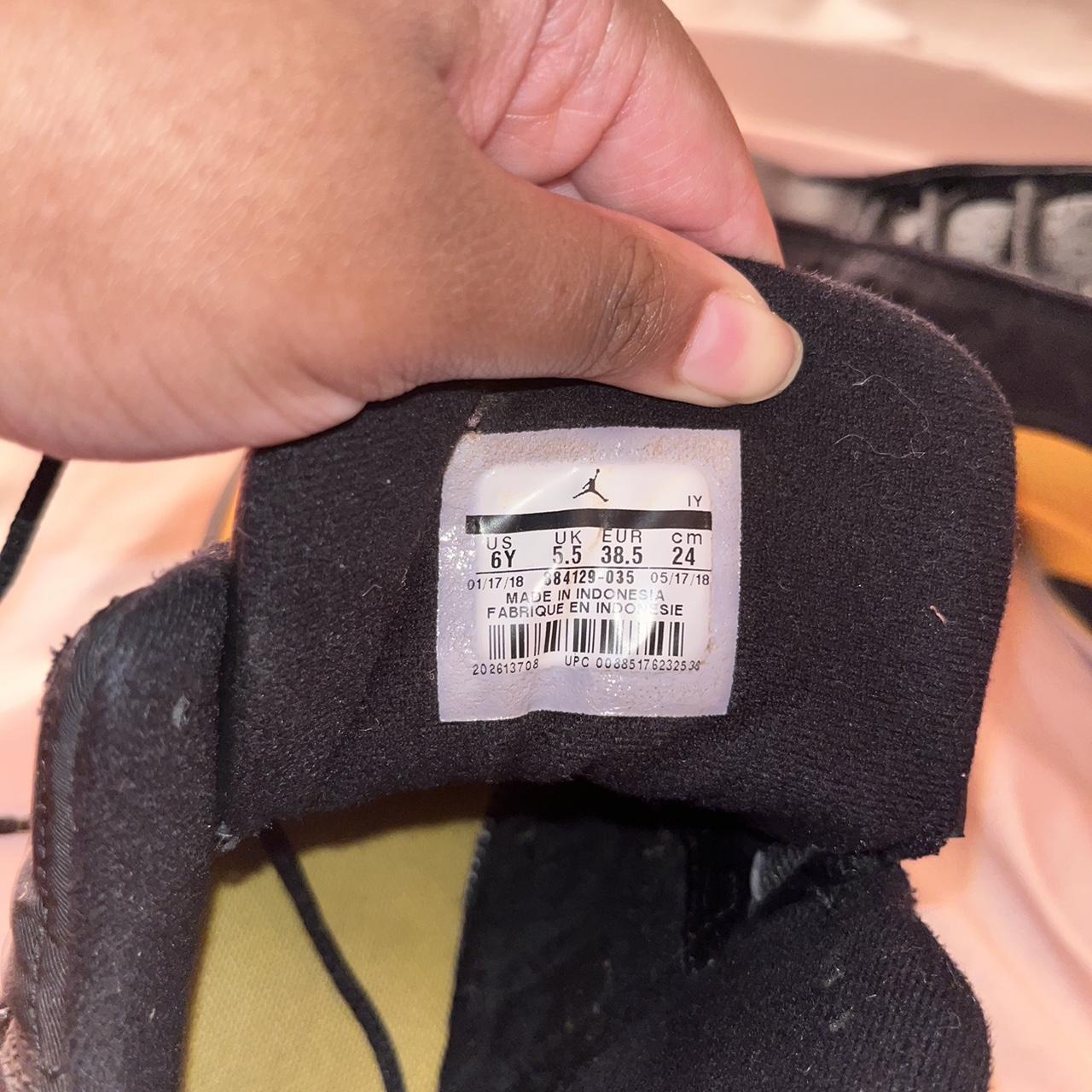 jordan black and yellow 13