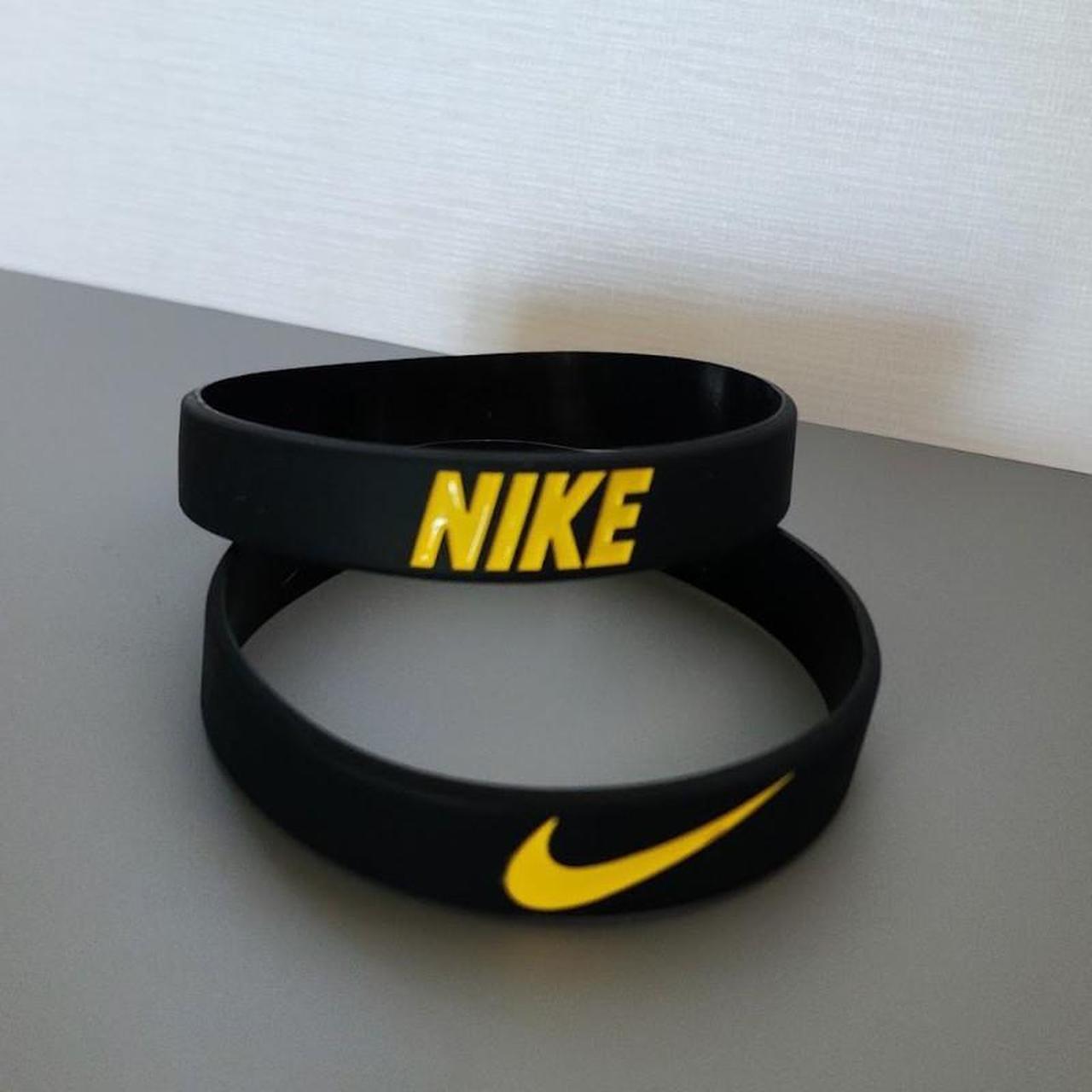 nike swoosh bracelet
