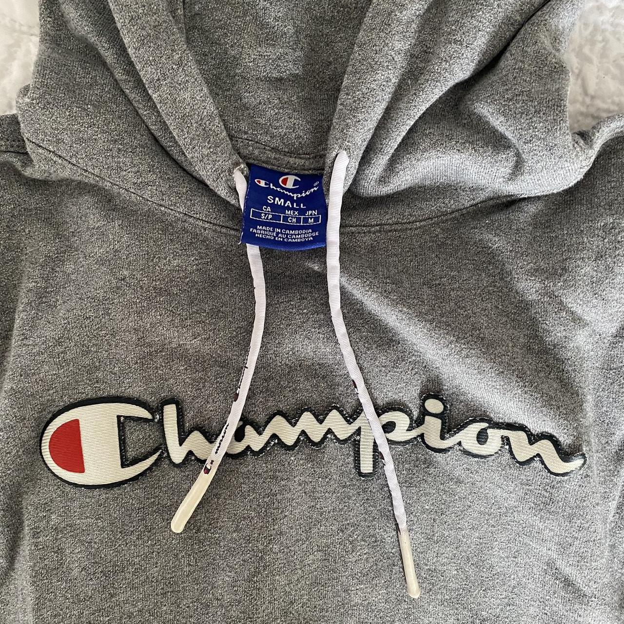 grey champion hoodie logo is peeling off a bit but... - Depop