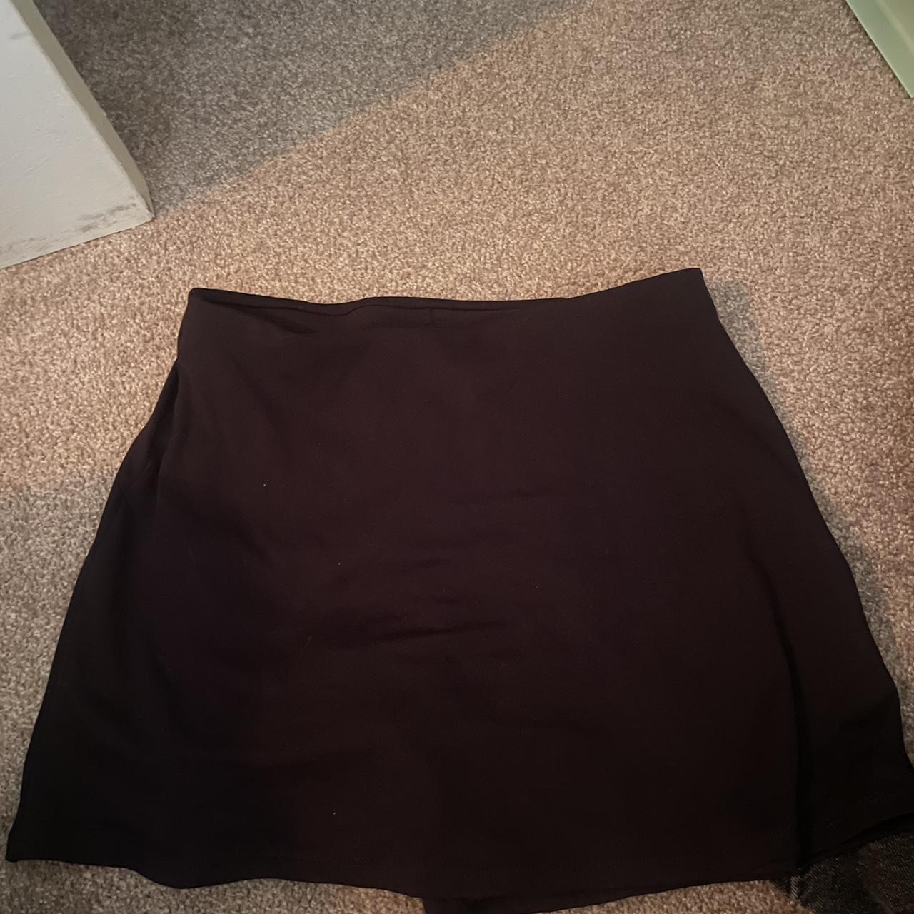 Oysho black mini athletic skirt in black and size... - Depop