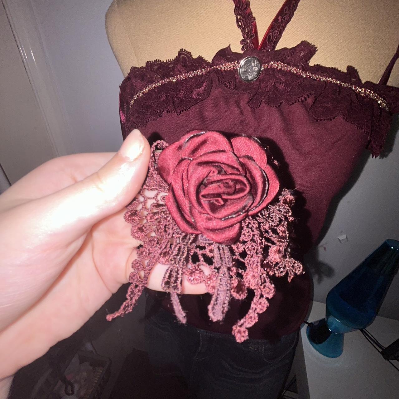 Axes femme rose cami, the rose has come off from the... Depop