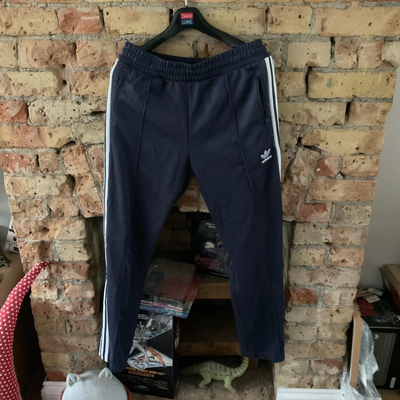 Navy adidas tracksuit bottoms medium adidas... Depop
