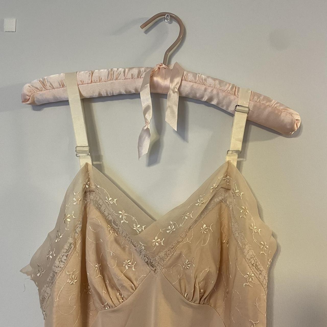 Blush pink slip dress with lace chest design and hem... Depop