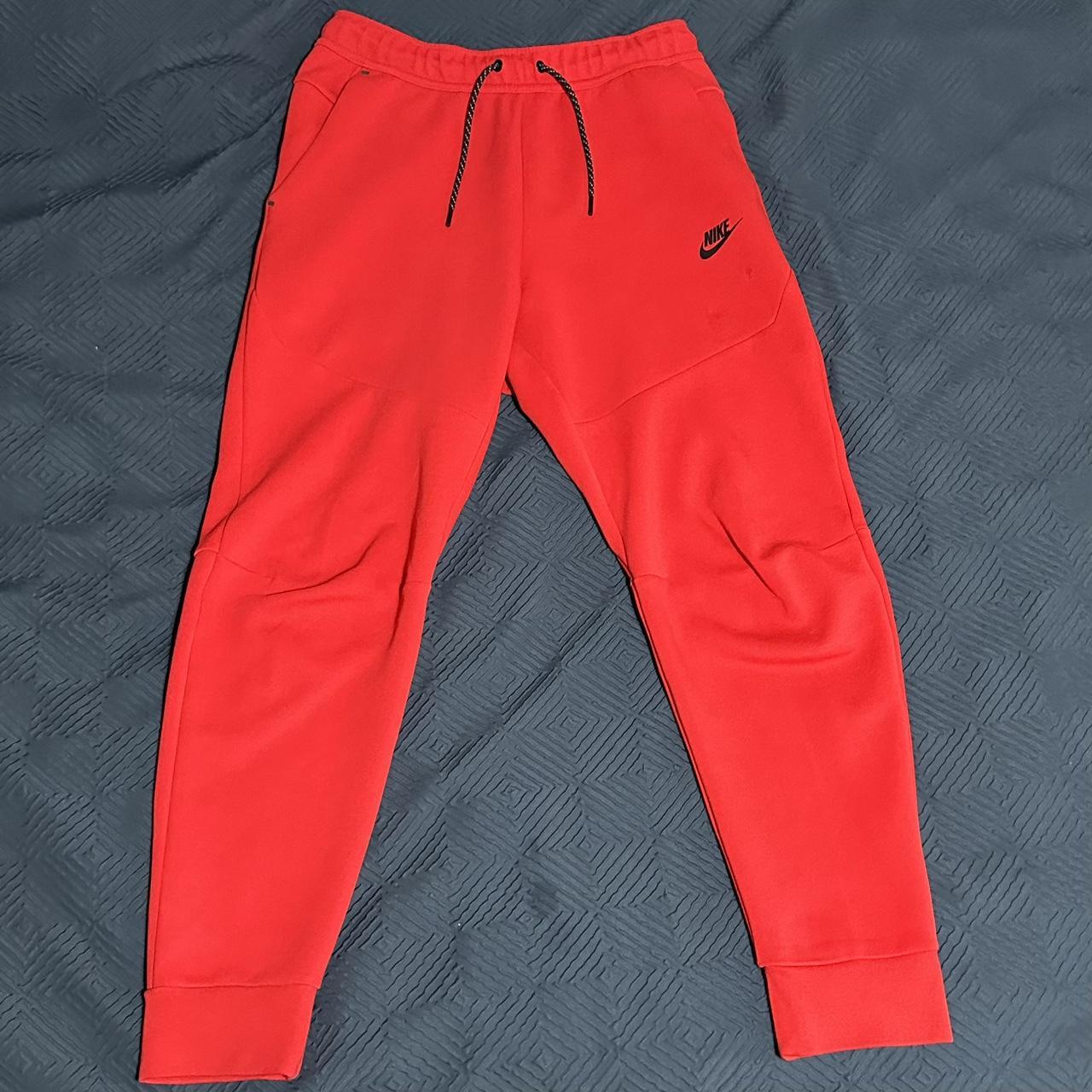 nike tech red joggers