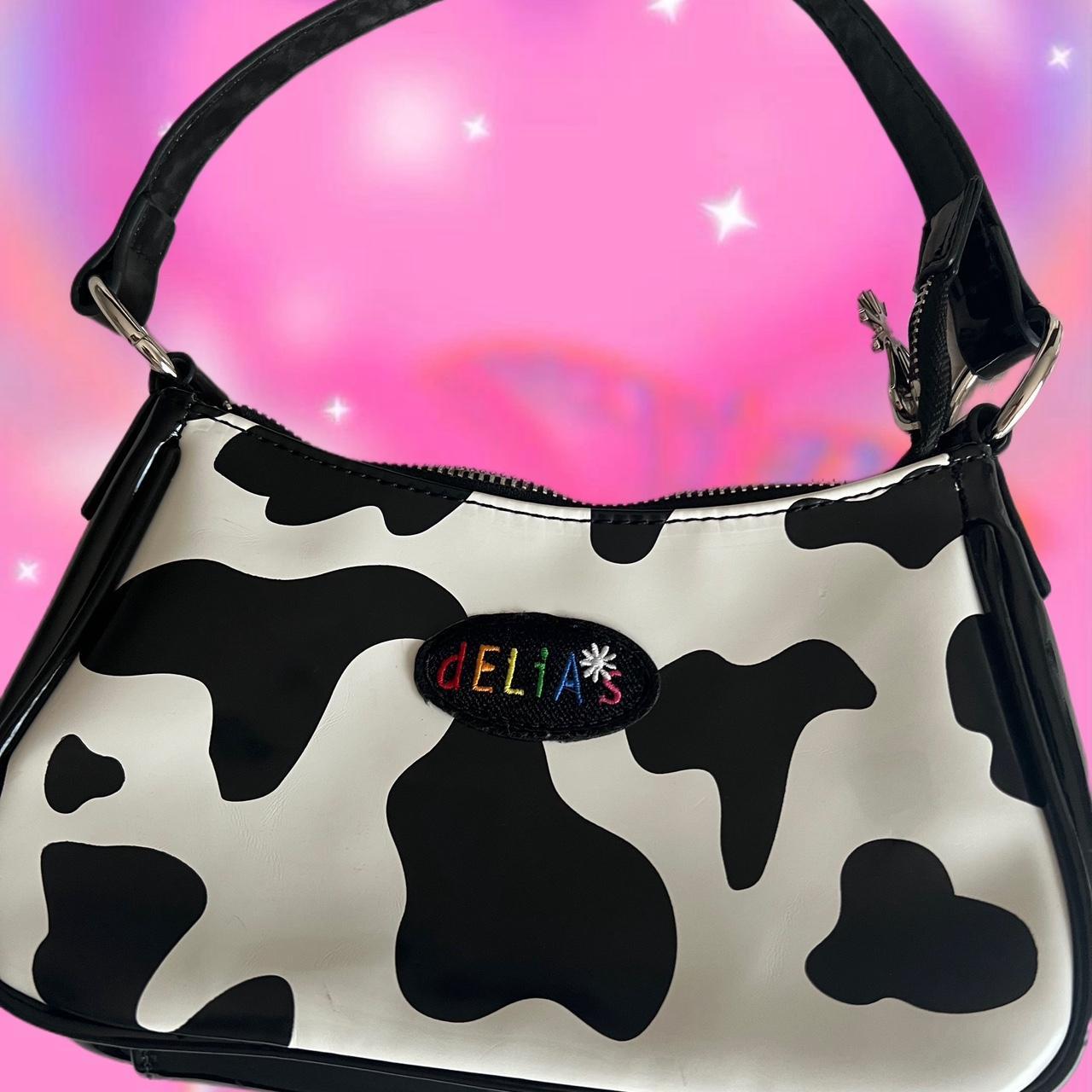 Delias cow purse sale