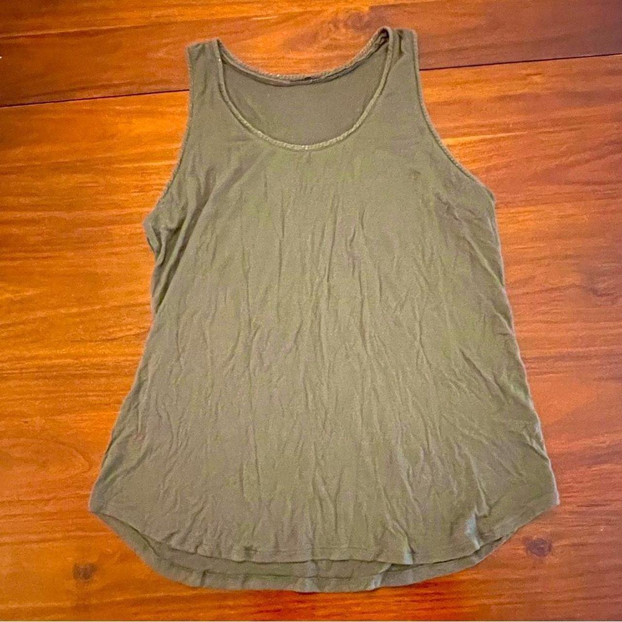 Forrest green color. Spandex blend. Hem for neck and... - Depop