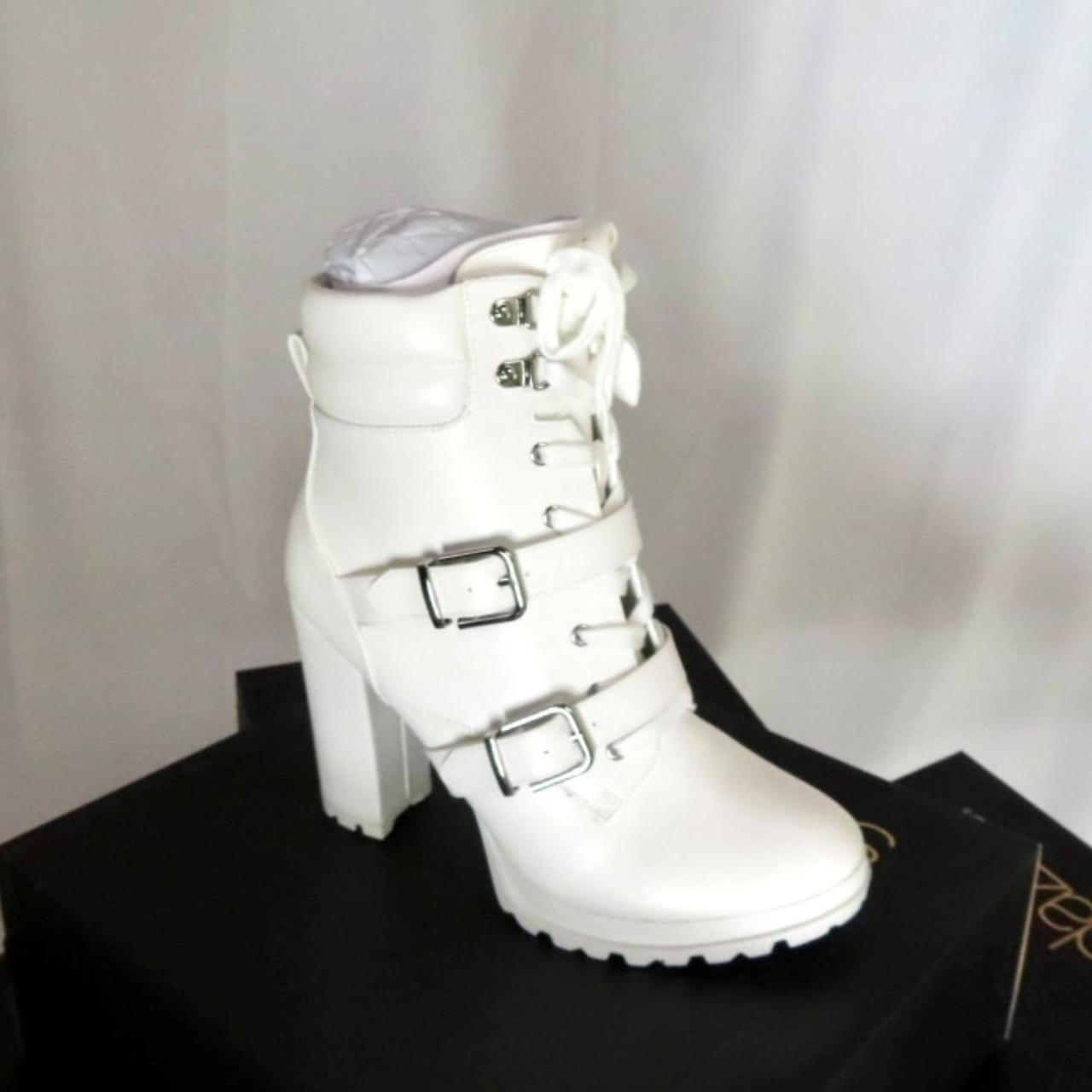 White boots with outlet straps