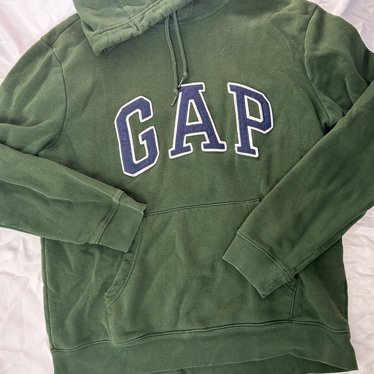 gap forest green hoodie has small rip at the top... - Depop