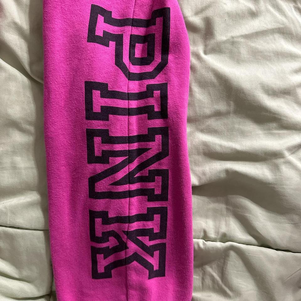 Pink sweat pants with black letters on the side - Depop