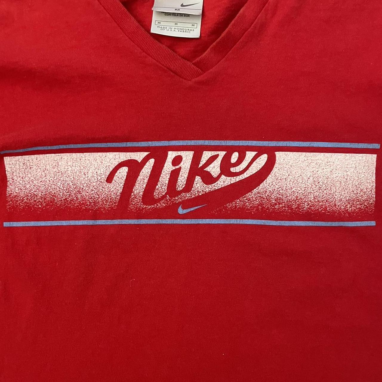 womens red and white nike shirt