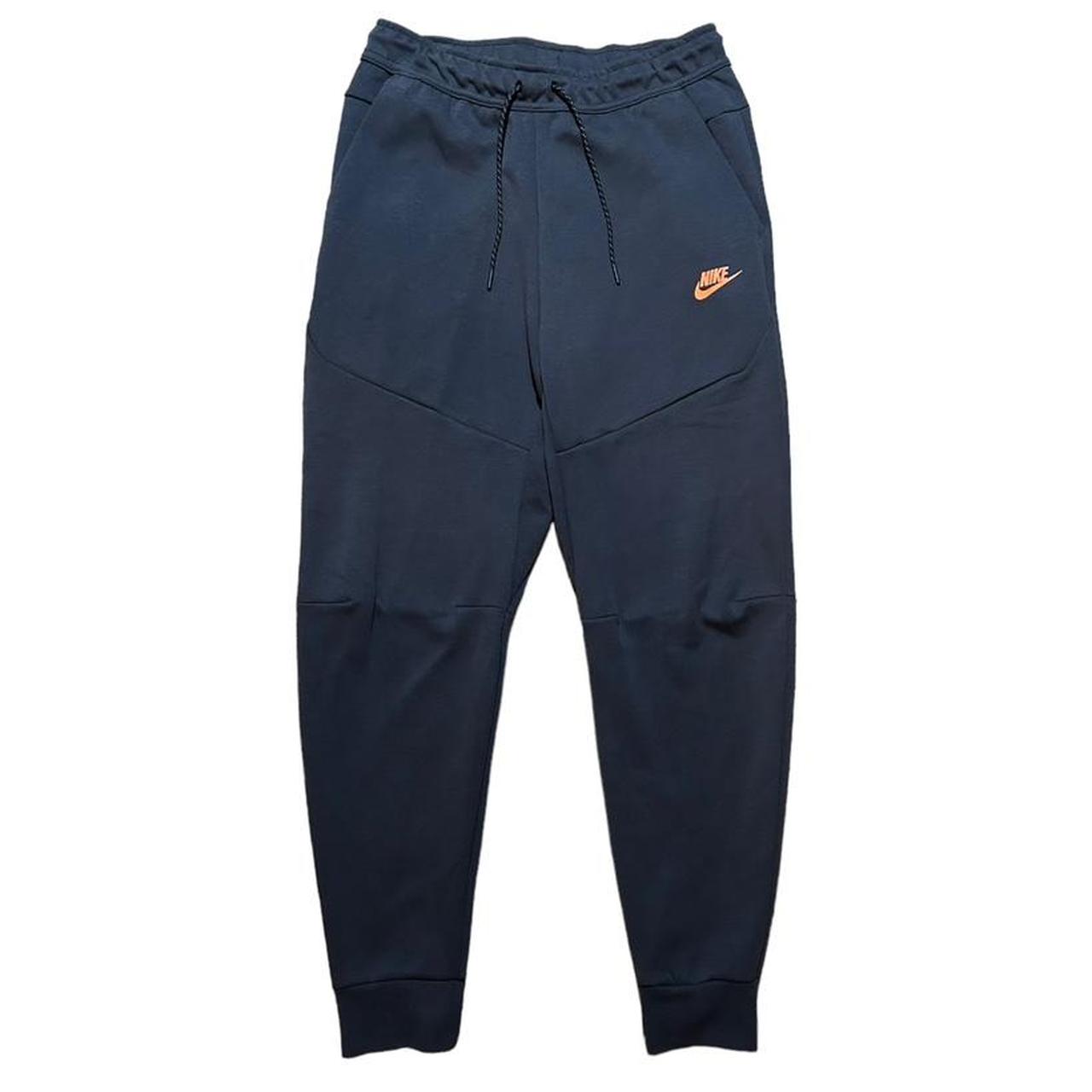 Black and best sale orange nike joggers