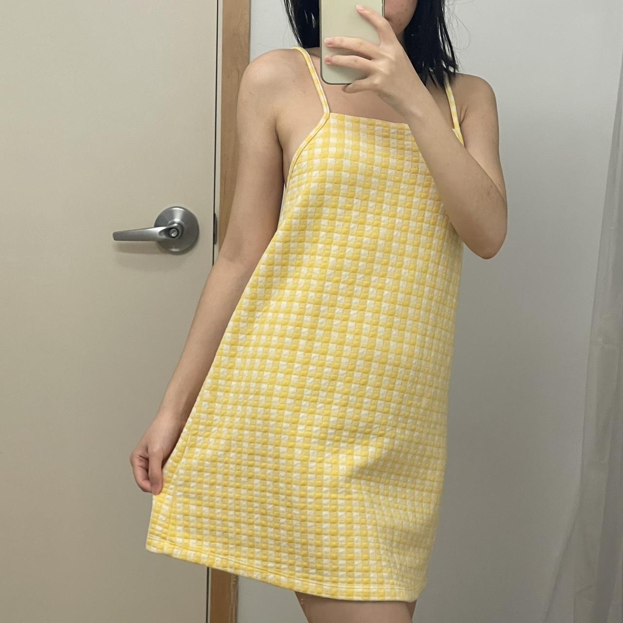 Zara yellow store and white dress