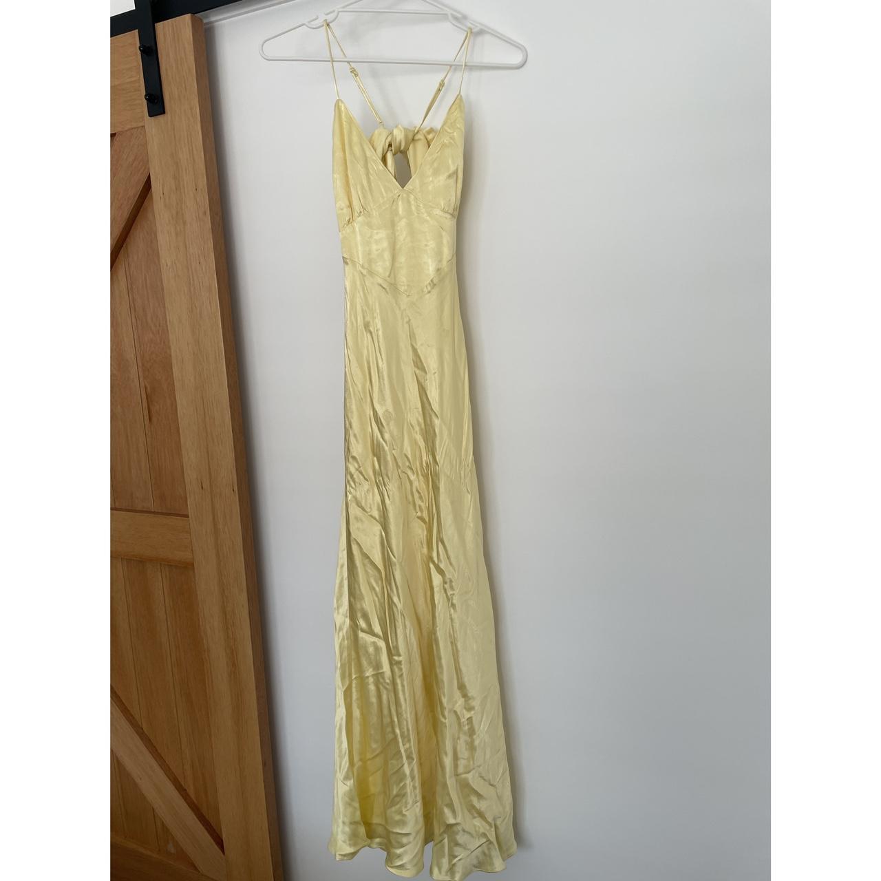 Stunning yellow maxi dress with back bow detail from... - Depop