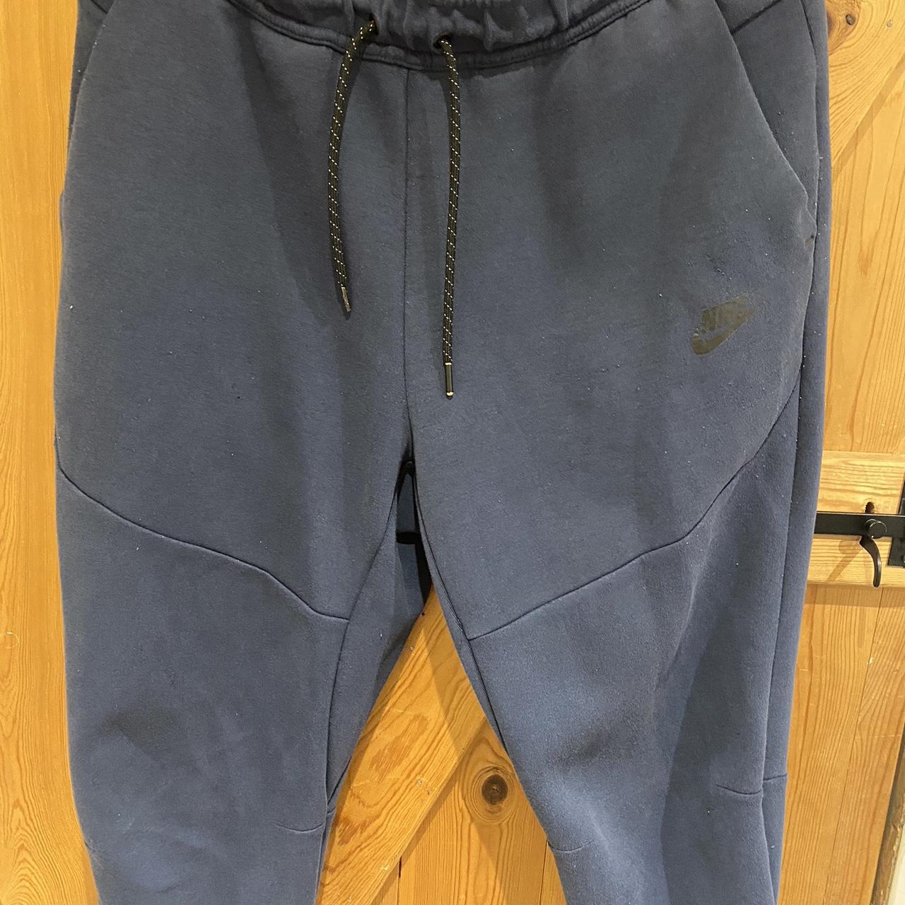 nike navy tech fleece bottoms size medium bobbles... - Depop